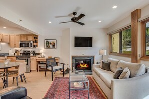 Living room with wood-burning fireplace