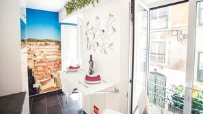 Table for 2 with a lovely view over the avenues of Lisbon #airbnb #airbnblisbon #portugal #pt #lisbon #kitchen #tablefortwo #lovelyview