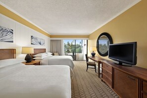 2 Double size beds, perfect escape after a long day of sightseeing. The exact unit will be assigned upon arrival. Views, colors, and decorations may vary.