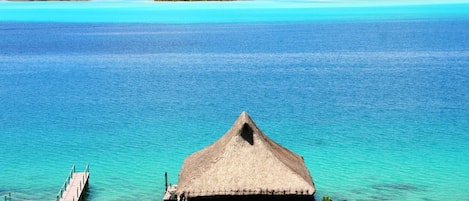 The Over Water Bungalow overlooks the beautiful lagoon of Bora Bora