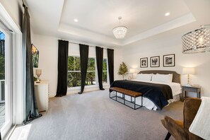 Experience luxury and comfort in your main floor master bedroom, curated to provide a thoughtfully designed retreat.
