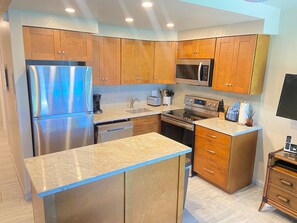 Kitchen island w/granite countertops.