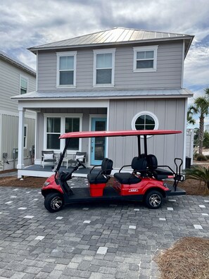 Six-seater golf cart included!