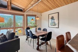 The dining table is perfect for enjoying meals, card games, or just catching up on the days adventures.