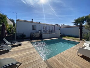 Balcony, terrace with swimming pool in the garden