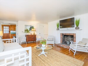 Living room looking into dining to left and hallway to bedrooms and bath on right-63 High Point Rd N Chatham - Cape Cod - New England Vacation Rentals