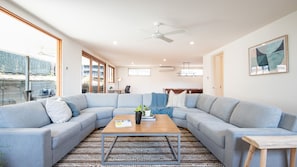 Family reunions made easy on this huge couch. The perfect space to reconnect and catch up with family and friends