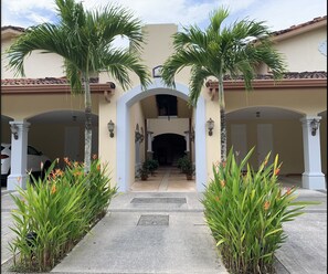 Outside of your Condo (on ground level ⬆️ ahead) and parking spot (to the ⬅️)