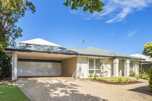 Nestled at the end of a quiet driveway, this beautifully renovated home offers privacy, modern comforts, and an unbeatable location close to the beach and town.