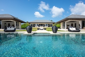 Ananda Estate from the beach. Main House in background; Pavilions at left & right