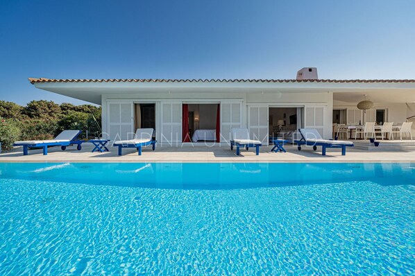 A superb white villa with private pool in Portobello di Gallura, Sardinia.