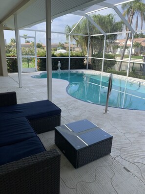 Heated pool with canal access