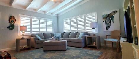 Living room area with new plantation shutters
