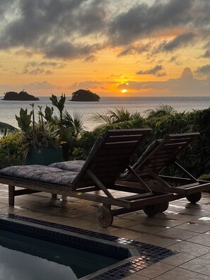 Amazing Sunrise and relaxing loungers.