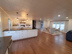 Kitchen view of dining room & sitting area