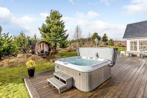 A hot tub and the sauna pod.