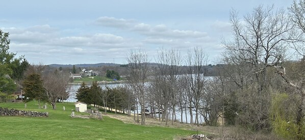Only thing between you and the lake is the trail, access to public dock as well