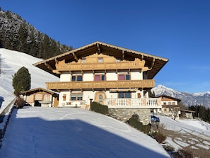 Sky, Building, Mountain, Snow, Window, Plant, Slope, House, Tree, Landscape