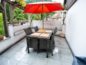 Table, Property, Furniture, Plant, Outdoor Table, Outdoor Furniture, Umbrella, Interior Design, Rectangle, Shade