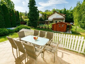 Table, Plant, Sky, Furniture, Cloud, Tree, Building, Nature, Chair, Outdoor Furniture