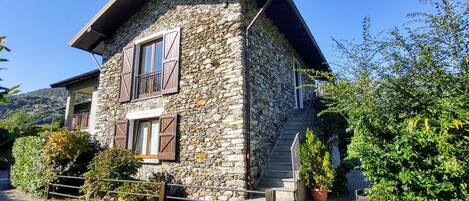 Plant, Sky, Building, Window, House, Tree, Cottage, Road Surface, Slope, Landscape