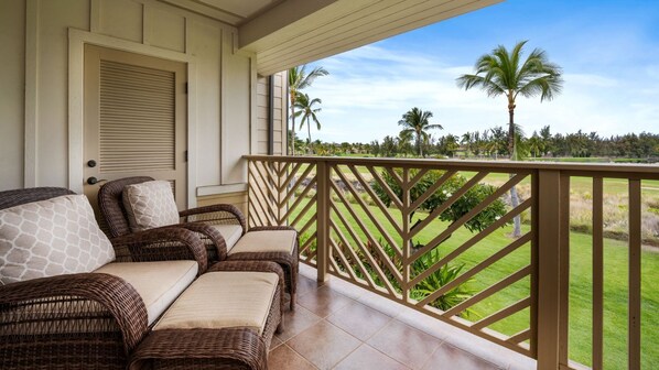 Enjoy morning coffee on the Primary bedroom lanai