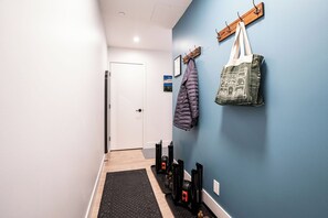 Unit entrance featuring boot dryers in the winter