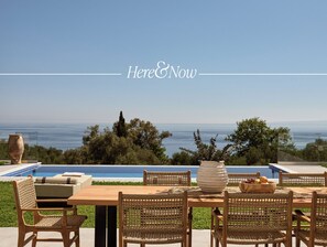 Sublime outdoor dining settings, overlooking the pool & sea.