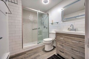 Full bathroom with shower on lower level