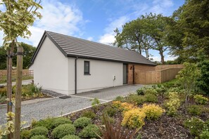 Outside of cottage and parking
