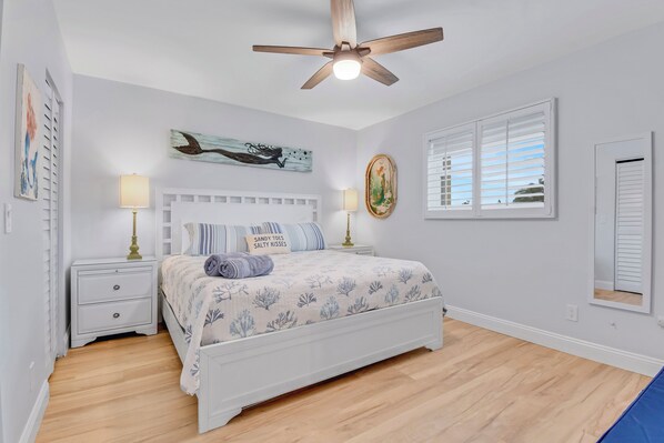 Relax in this cozy bedroom with a plush king bed, perfect for recharging after a day of adventure.