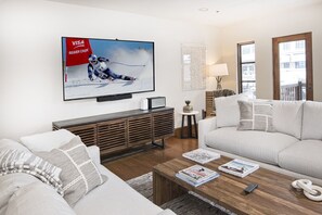 Updated living room with 70 inch HDTV and retro Marshall Bluetooth speaker! 