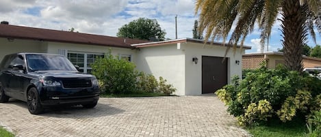 Wrap around driveway. Guests do not have access to garage. 