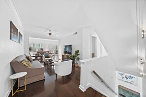 2nd floor living room, located right next to the dining room.