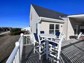 Uncovered front balcony sitting area