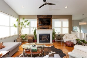 Large couch and leather sofas.