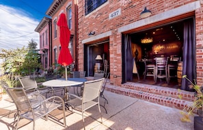 Front patio fenced off. Open the garage doors and instant indoor outdoor space