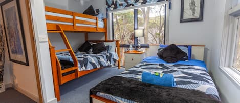 Bedroom 3 - Sleeps 4 (Tri-bunk & King Single Bed) with wall mounted TV.