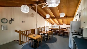 Mezzanine level of the dining & kitchen area with cathedral ceiling.