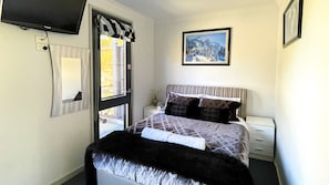 Bedroom 4 - Sleeps 2 (queen bed) with wall mounted TV & all linen supplied
