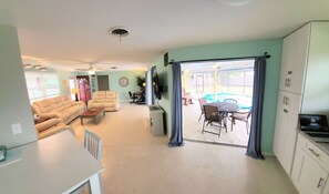 Sliding doors from kitchen, living room and master bedroom open to the lanai.