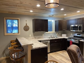 Full size kitchen overlooking Eagle Lake