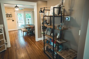 Hallway separating the living room from the kitchen