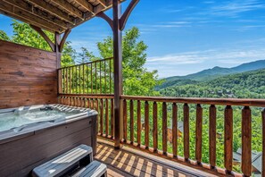 Relax in the hot tub while overlooking the mountain views (lower level deck).