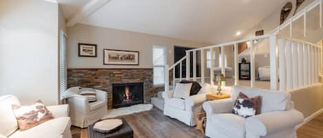 Lower living area with fireplace.