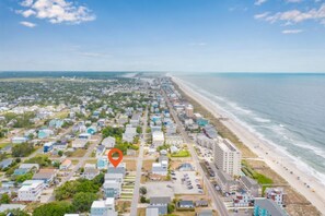 Happy-Ours is just one block from the beach!