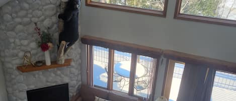 Main living area overlooking the lake with deck.