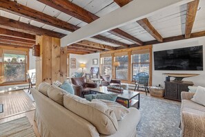 Living room with room for the whole family with 70 inch tv