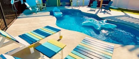 Private backyard pool and hot tub, plenty of chairs with sun and shade options!