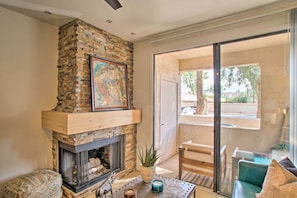 Living Room | Central Air Conditioning | Wood-Burning Fireplace | Balcony Access